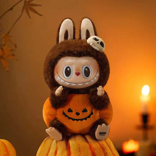 Serie de Halloween LOS MONSTRUOS: Muñeco de peluche de vinilo con forma de calabaza sentada 